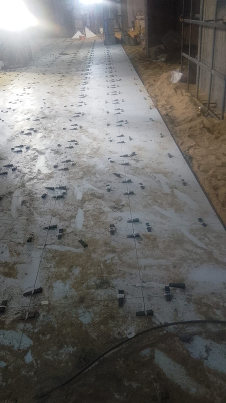 Progenesis 1700 m² laser leveled porcelain flooring works